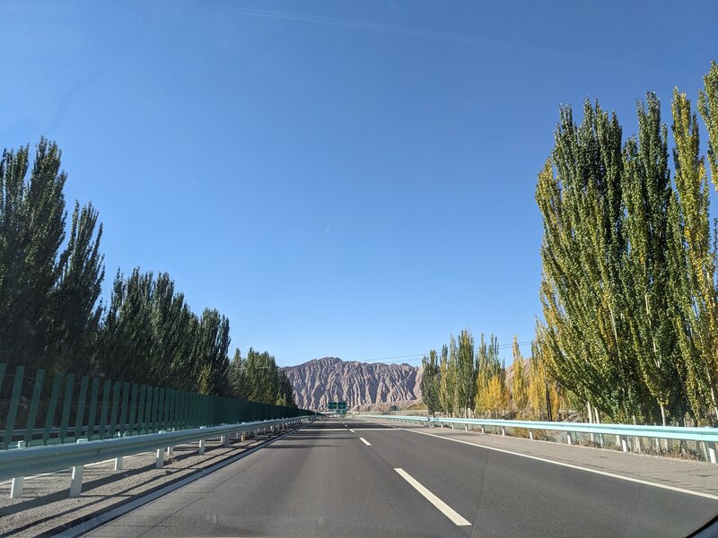 Driving toward a strangely shaped mountain