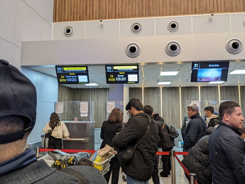 A line for checking into the flight